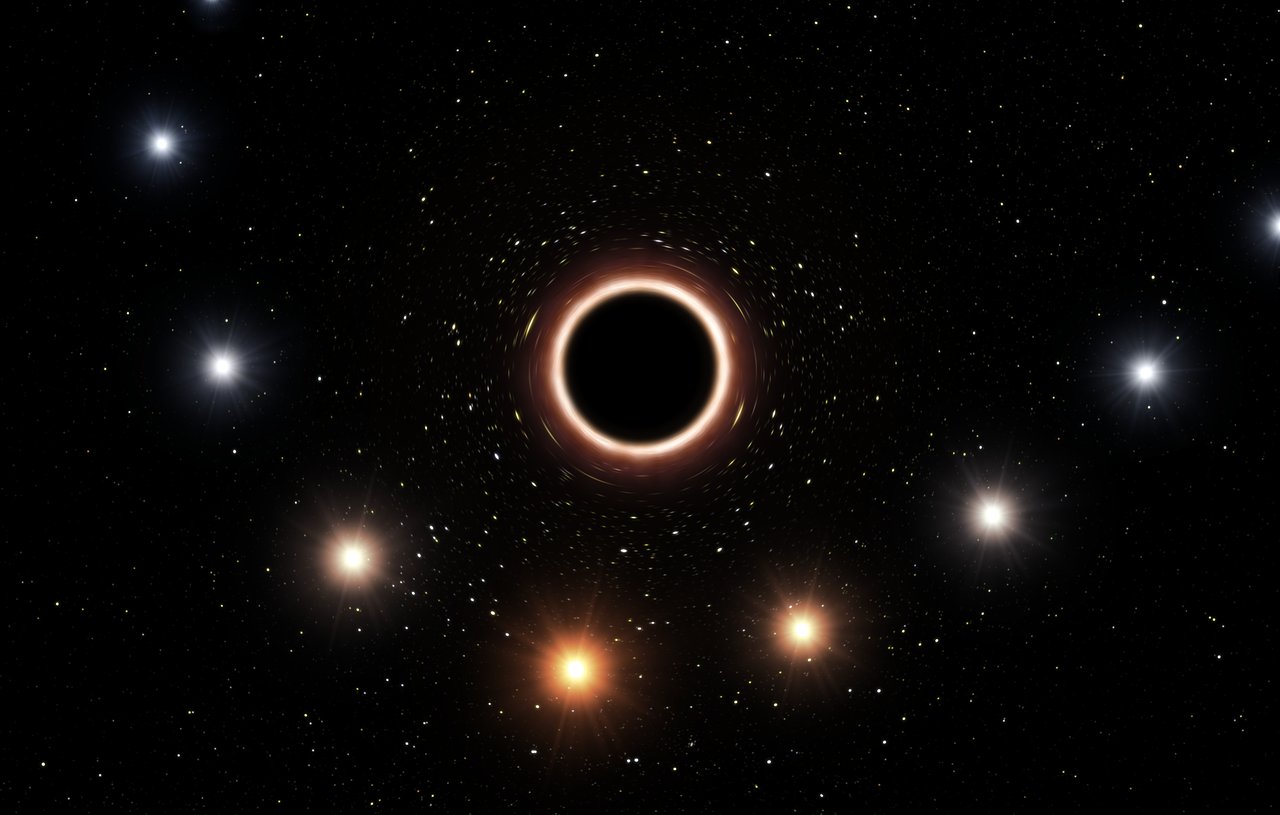 Artist's impression of the star S2 passing close to the supermassive black hole at the center of the Milky Way.